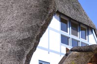 find rated Tomlow thatchers